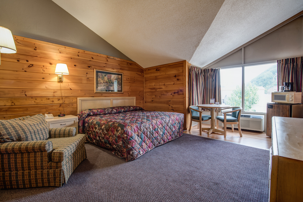motel room with king size bed and jacuzzi